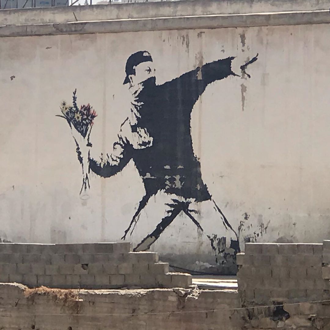 Image 6- ‘Flower Thrower’ banksy